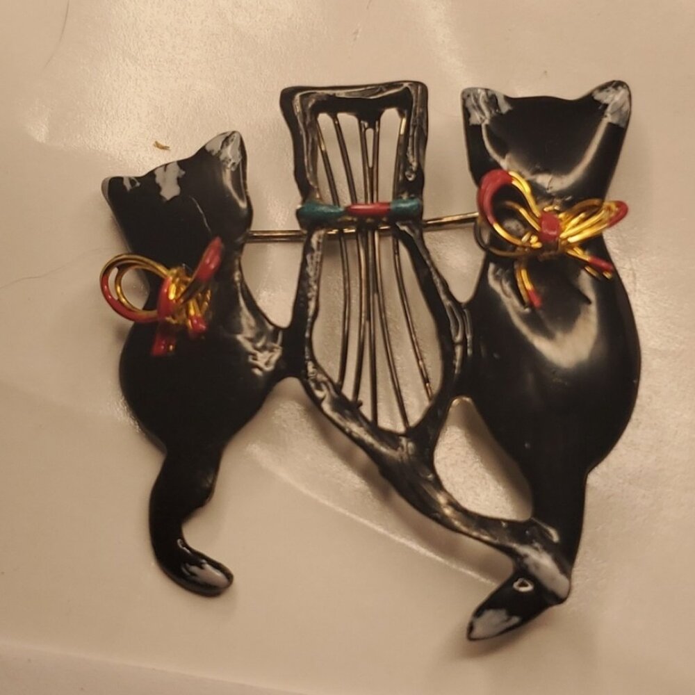 Upcycled Vintage black cat broach with with red gold and turquoise colors white